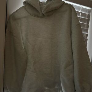White pullover with hood women’s size medium.
